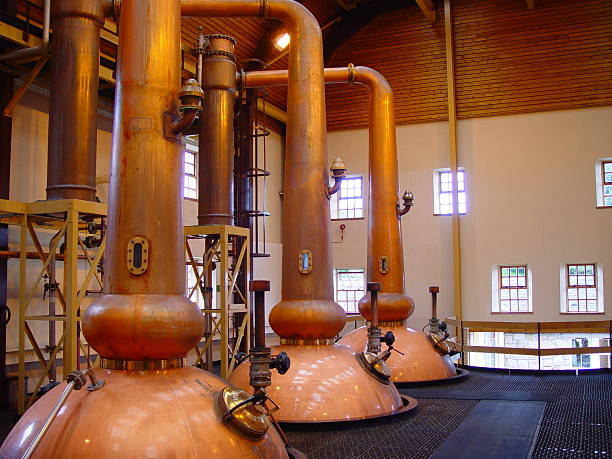 Whisky Distill a whisky distill at the scotch highlands. distillery stock pictures, royalty-free photos & images