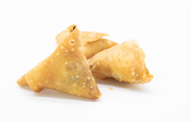 istock deep fry Samosa isolated on white background, 1390827640