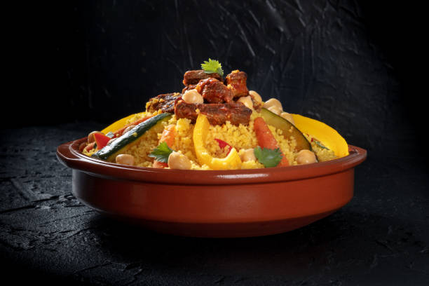istock Couscous with meat and vegetables, traditional Moroccan dish, with chickpeas 1390828302