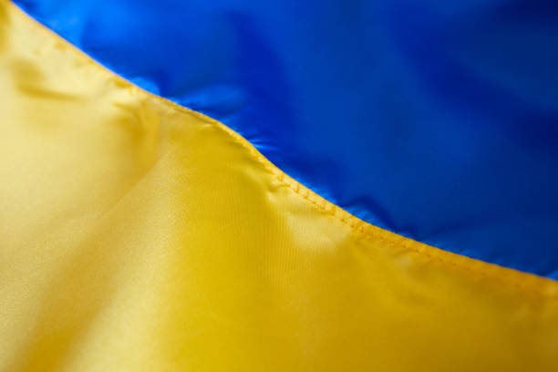 istock Silk waving Ukrainian national flag background 1390828332