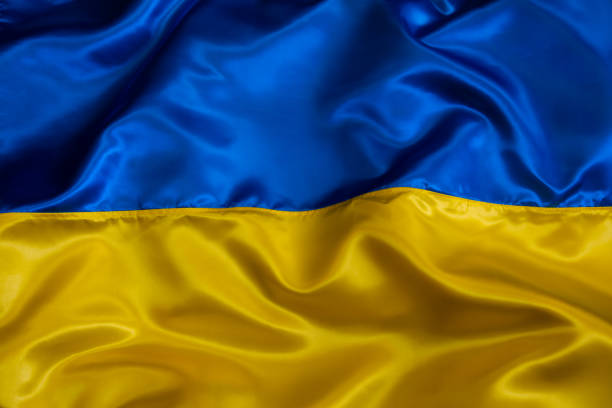 istock Silk waving Ukrainian national flag background 1390830440
