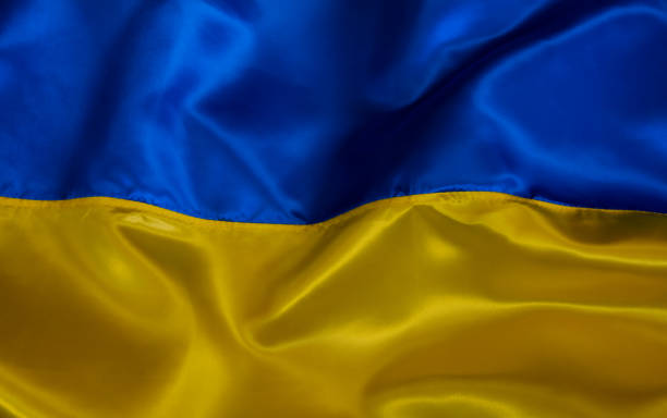 istock Silk waving Ukrainian national flag background 1390830631