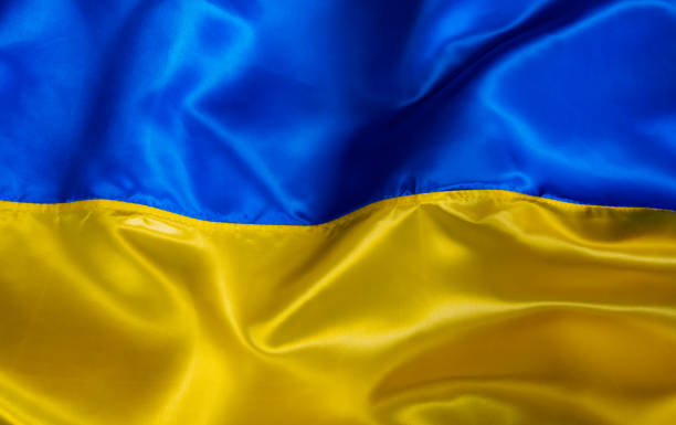 istock Silk waving Ukrainian national flag background 1390830847