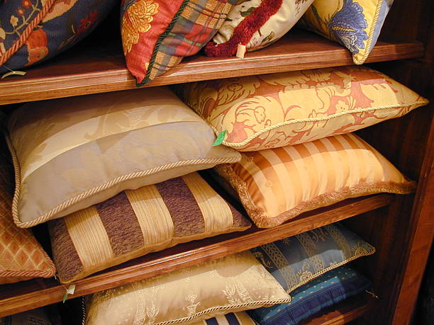 Pillows on a shelf stock photo