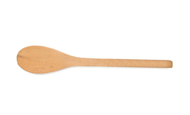istock wood spoon over on white background 1390830928