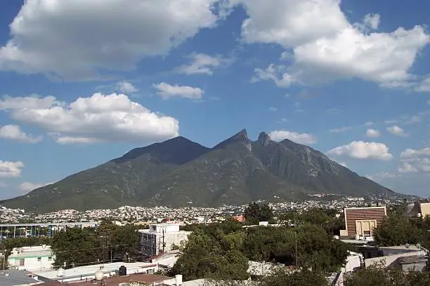 This is a mountain in Monterrey, Mexico. It's called Cerro de la Silla.