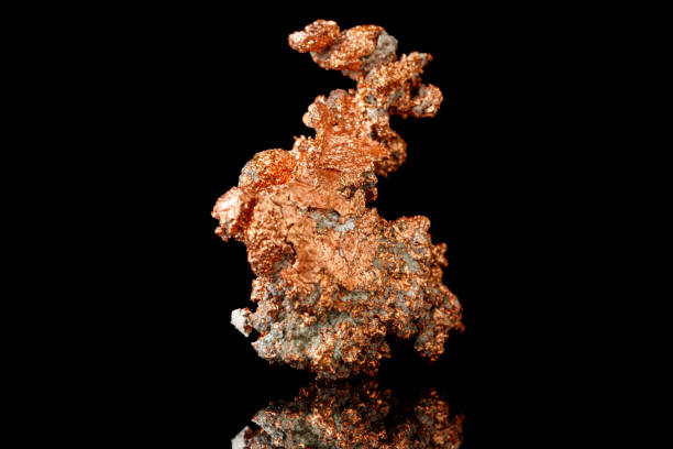 istock Macro mineral stone Copper on black background 1390831769