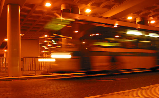 istock bus - another moving bus at the station 139083192