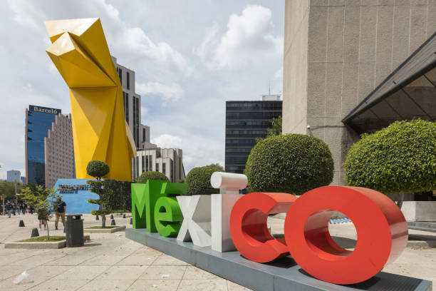 Torre Caballito next to mexico lettering, sunny day stock photo