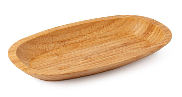 istock Wooden plate isolated on white background, close up 1390837476