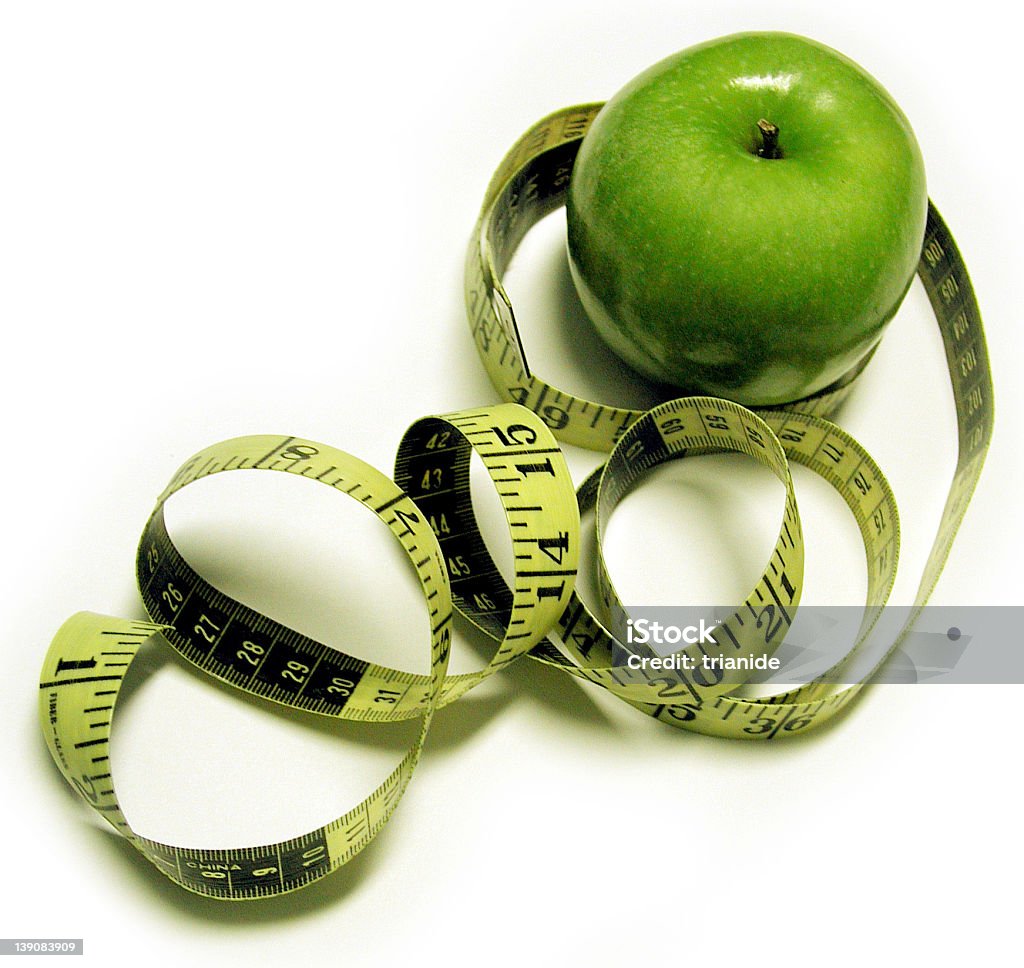 Verde manzana y cinta métrica de 1 - Foto de stock de Alimento libre de derechos