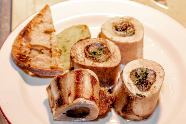 istock Baked beef bones with bone marrow are on a plate 1390841795