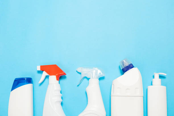 istock cleaning agent on a blue background on the side. Professional cleaning products, general cleaning. Household chemicals top view 1390848108