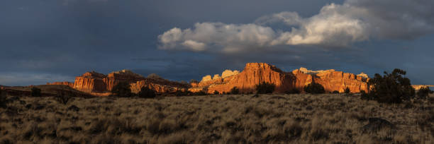 istock Last Light of Day Casts Light Over Capitol Reef Rocks 1390848978