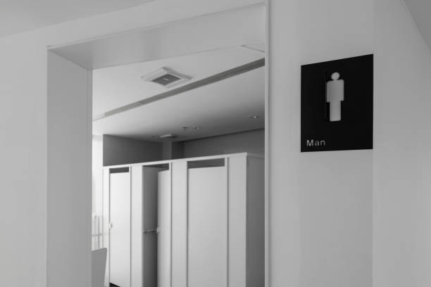 sign outside the men’s room - urinal clean contemporary in a row imagens e fotografias de stock