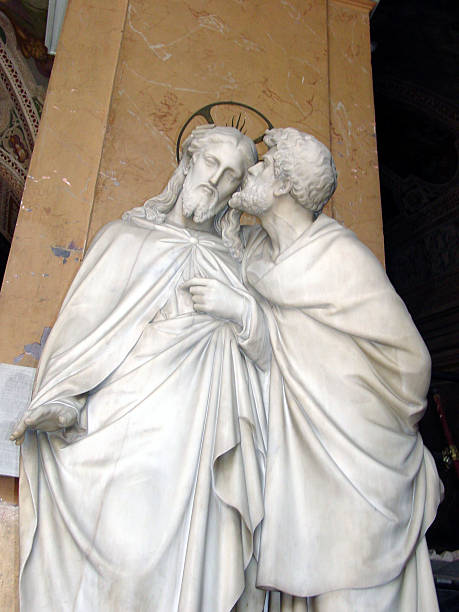 The Betrayal Italian Scupture of Christ and Judas. judas stock pictures, royalty-free photos & images