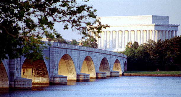 Arlington Bridge, Washington DC A view across the Potomac towards the Lincoln Memorial. arlington memorial bridge photos stock pictures, royalty-free photos & images
