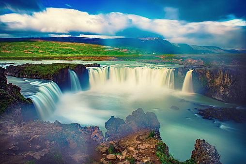 Godafoss waterfall in Iceland, summer natural travel background