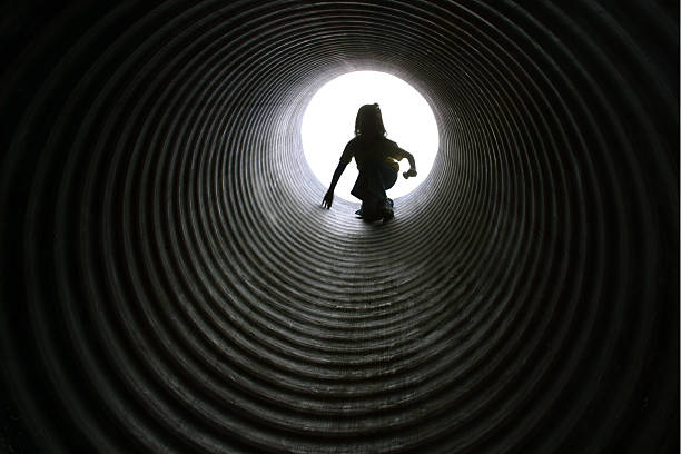 istock Little Girl In a Pipe 139085872