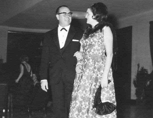 couple at a party in 1950. - high society men tuxedo party imagens e fotografias de stock