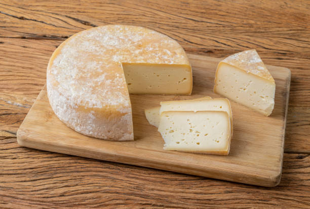 istock Artisanal Canastra cheese from Minas Gerais, Brazil over wooden table 1390860039