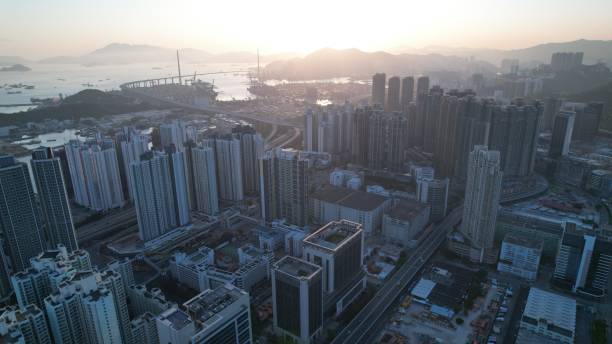 istock crowded city and harbor view during sunset in Hong Kong 1390861045