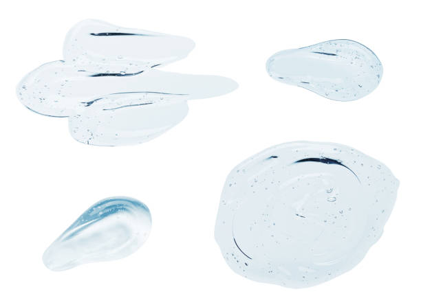 istock Clear liquid serum gel smudges with bubbles set isolated on white 1390861077