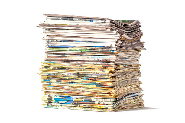 istock Bunch or pack of old newspapers isolated on white background 1390863745