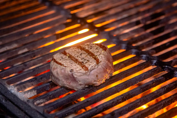 istock Beef minion steak is fried on a charcoal grill 1390865531