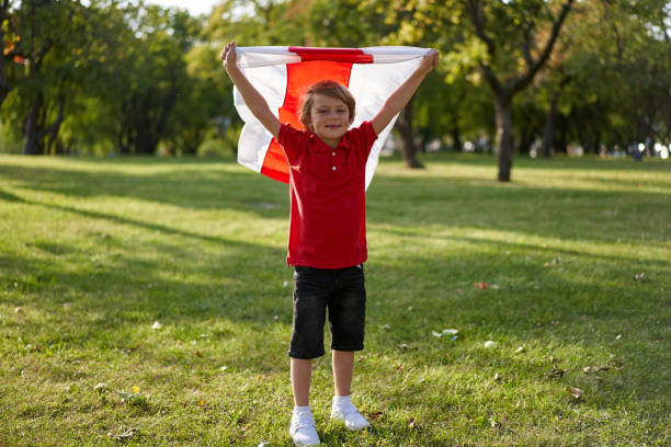 People at a protest in Belarus. Boy with a flag at a protest. stock photo