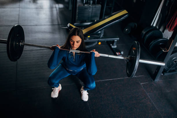 istock Fit woman weightlifting 1390865592