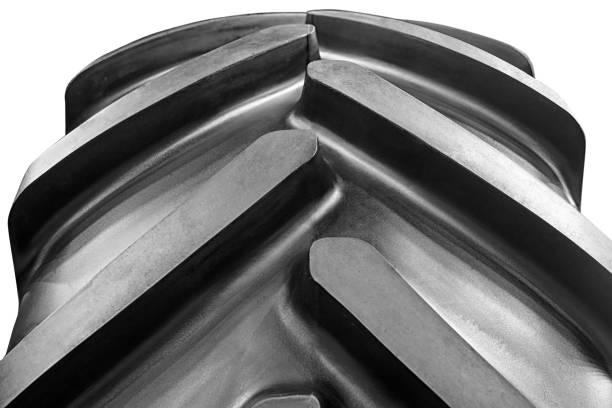 Closeup of a big wheel protector of a tractor or truck. stock photo