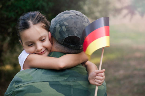 istock German Soldier And His Daughter 1390866711