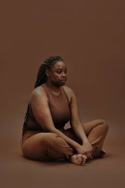 istock Pensive black woman portrait 1390874684