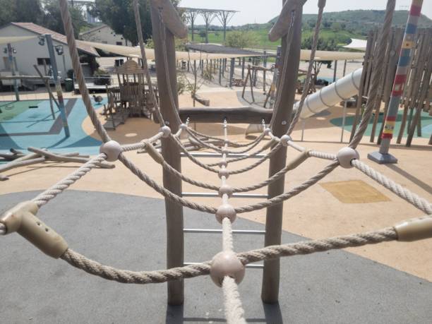 istock Rope Net Challenge in a Wooden Playground 1390875791