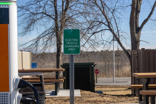 istock Electric vehicles charging stations sign 1390875815