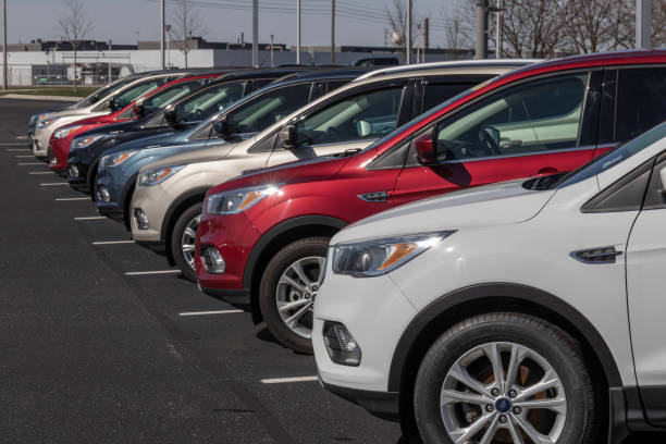 Used car display at a Ford dealership. With supply issues, Ford is buying and selling many pre-owned cars to meet demand. stock photo