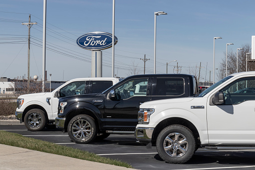 Halifax, Canada - May 15, 2012: Looking down onto a car dealership located on the Bedford Highway featuring a wide variety of vehicles ranging from Mazda compact sedans to Dodge pickup trucks.