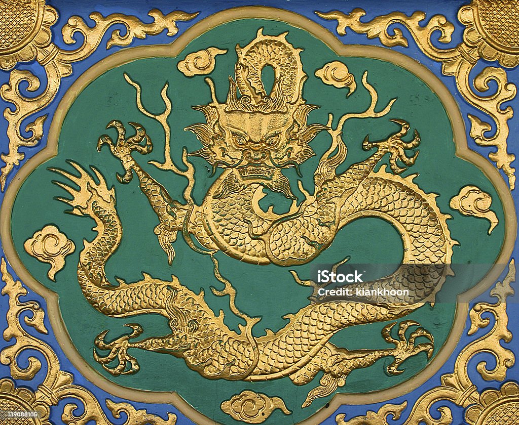 Chinese Dragon 02 Chinese golden dragon at the wall. Ancient Stock Photo
