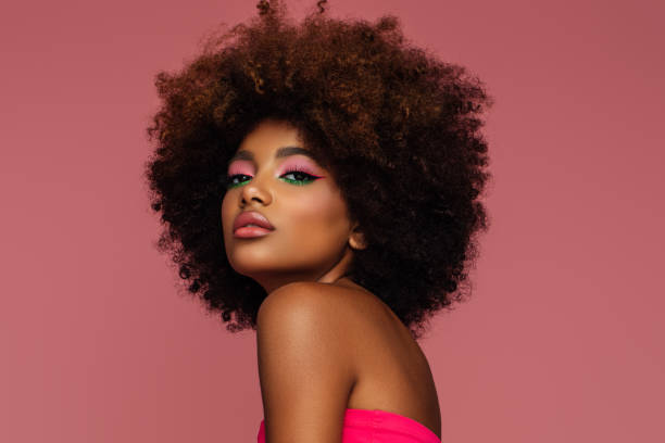 istock Beautiful afro woman with bright make-up 1390881716