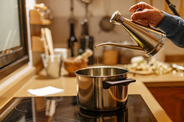 istock Pouring olive oil 1390881753