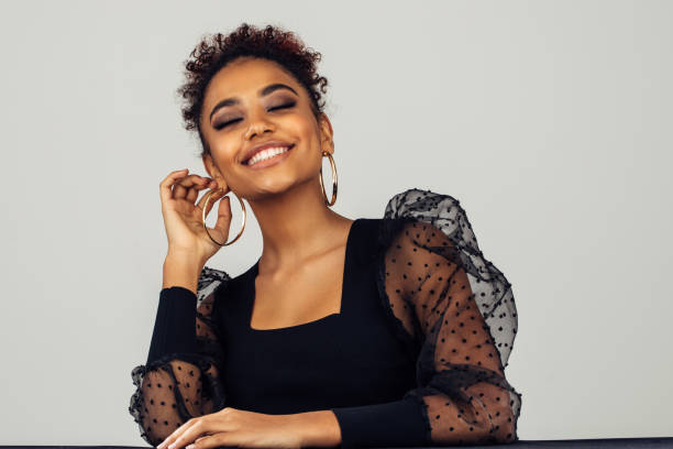 istock Beautiful afro woman with perfect make-up 1390882126