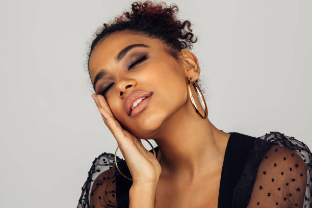 istock Beautiful afro woman with perfect make-up 1390882664