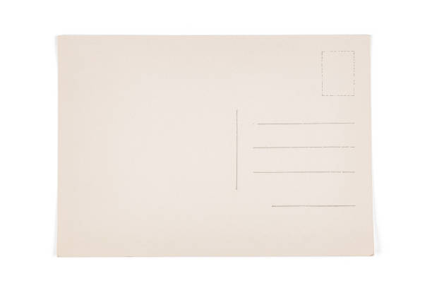 Old blank postcard close up for template and background. Isolated on white, clipping path included