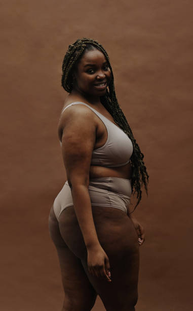 istock Happy African woman with plump figure 1390884062