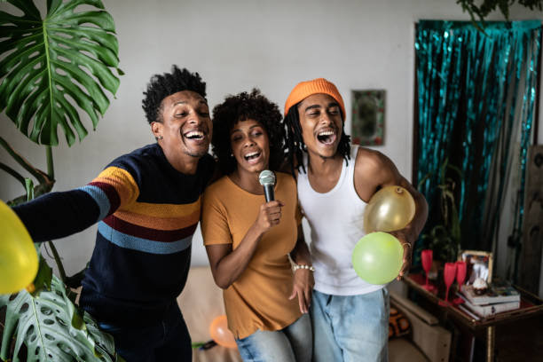 Friends singing together at home