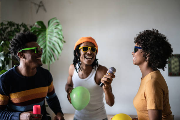 istock Friends singing together at home 1390885706