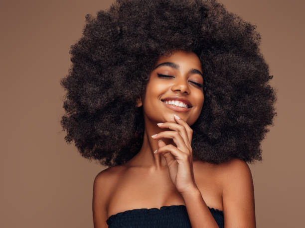 istock Beautiful girl with curly hairstyle 1390885826