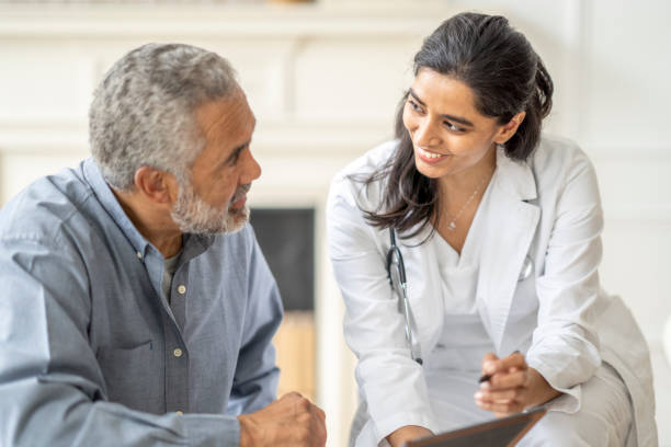 istock Homecare Visit with a Senior Gentleman 1390886686