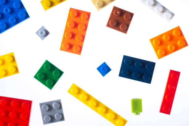 istock Colored plastic blocks of a children's designer on a white background. 1390888106